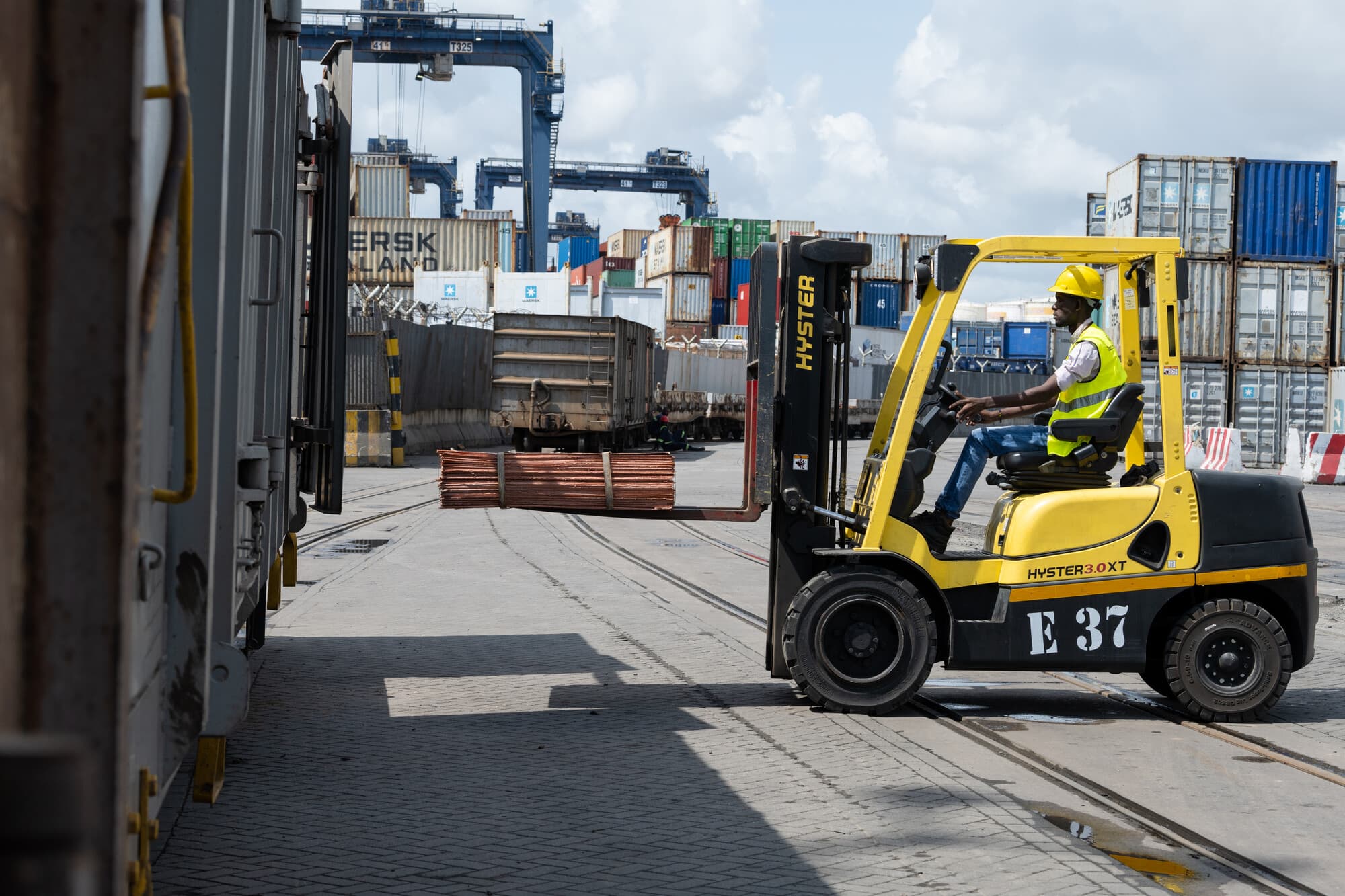Forklift working with a container